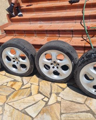 4 cerchi in lega orig. alfa  da 17"+ 2 gomme usate