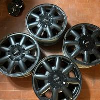Cerchi mini cooper 15 pollici con coperchietti