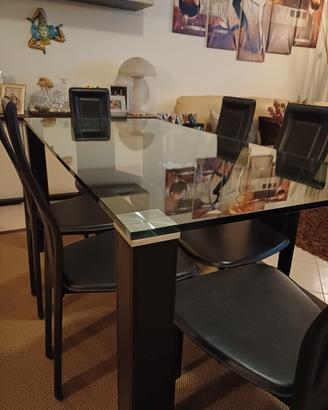 Tavolo da pranzo in vetro con 6 sedie similpelle
