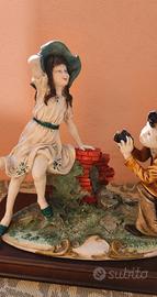 Statua Capodimonte con base in legno Ragazzo di Gi