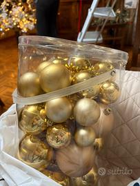 Scatola di palline dorate nuove 