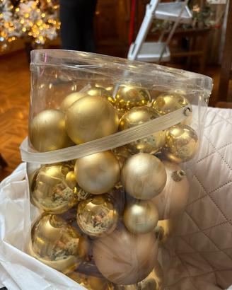 Scatola di palline dorate nuove 