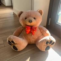 Orsetto peluche grande con fiocco rosso