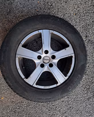 4 cerchi in lega + gomme Pirelli M+S