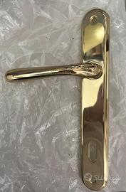 Maniglie porta Cottali Karol con placca – ottone