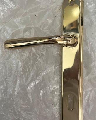 Maniglie porta Cottali Karol con placca – ottone