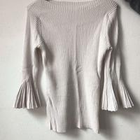 Maglia maniche a ventaglio