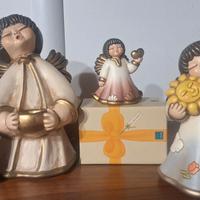 Thun angeli e donna con ulivo