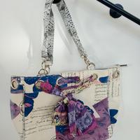 Borsa colorata con fiocco 