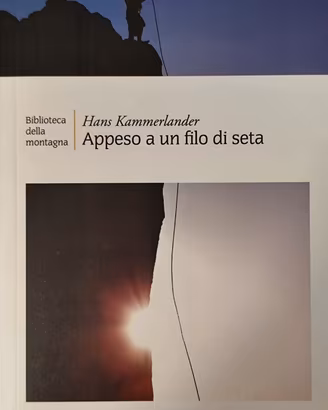 APPESO AD UN FILO DI SETA   ( alpinismo )