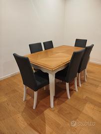 Tavolo allungabile bicolore e sedie imbottite