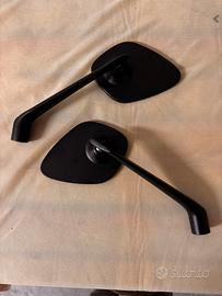Specchi moto universali