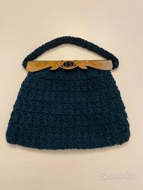 Elegante borsa-pochette vintage verde