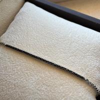 Tennis oro 18K con diamanti neri