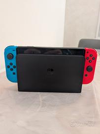 Nintendo Switch OLED Blu/Rosso Neon