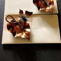 2 oggetti decorativi in ferro lavorato artigianale