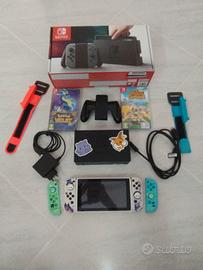 Nintendo Switch + 2 giochi + Cover + Cover Joystic