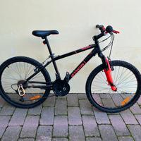 Bicicletta Mountain bike B Twin 24 pollici