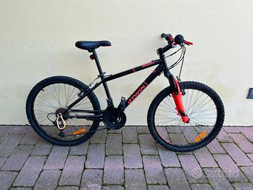 Bicicletta Mountain bike B Twin 24 pollici