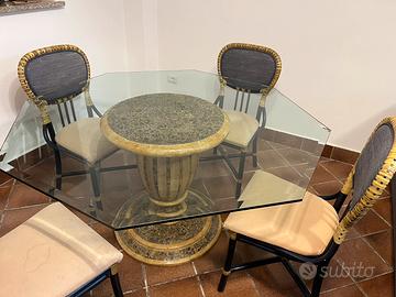 Tavolo in cristallo e sedie