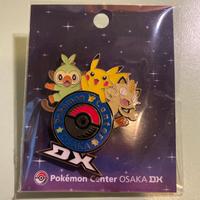 Spilla presa al pokemon center di Osaka