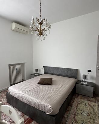 Stanza privata con bagno & cucina in condivisione