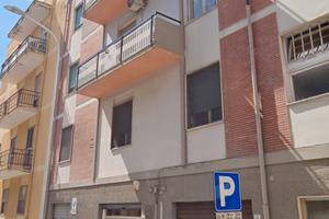 Locali commerciali e appartamenti