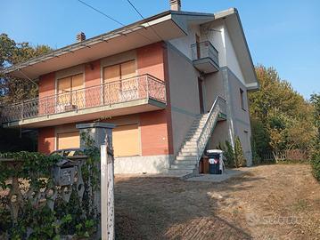 Appartamento in villetta con giardino e box auto