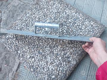 Attrezzo solleva quadrati di lavato