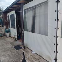 Veranda con travi in legno