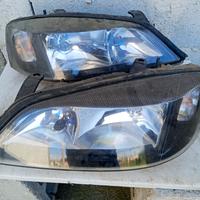 coppia fari Opel Astra G
