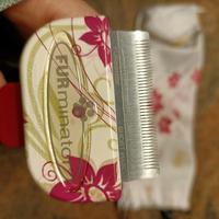 spazzola FURminator per cani e gatti a pelo medio