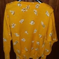 Maglia gialla con disegnati dei diamanti, taglia L