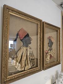 Due quadri profili orientalisti in cuoio e stoffa
