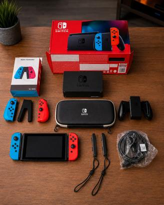 Nintendo Switch OLED completa + giochi + accessori