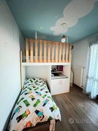 Camera a ponte Colombini con scala e scrivania