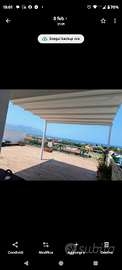 Pergotenda in PVC con telo retrattile elettrica
