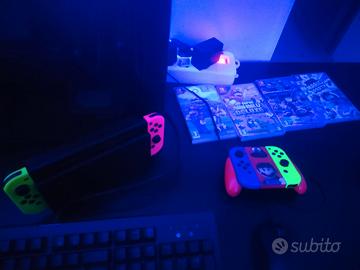 Nintendo Switch + 4 Joy-Con + Dock + 4 Giochi