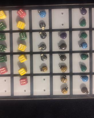 orecchini coccinella e dadi