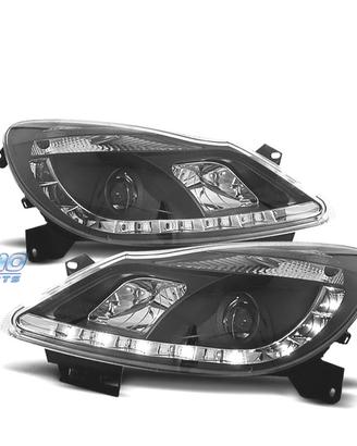 FARI OPEL CORSA D 06-10 LUCE DIURNA FONDO NERO