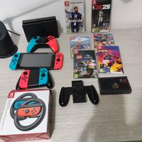 Nintendo switch con accessori e giochi