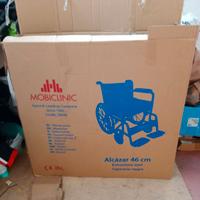 Carrozzina invalidi e deambulatore