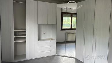 Armadio 8 ante con cabina armadio