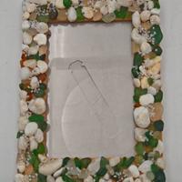 Cornice porta foto con pietre ciottoli spiaggia