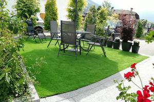 Moderna mansarda con giardino Pinzolo