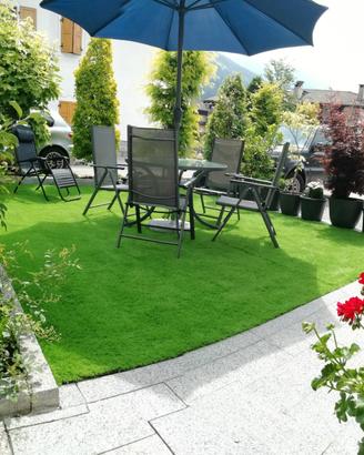 Moderna mansarda con giardino Pinzolo