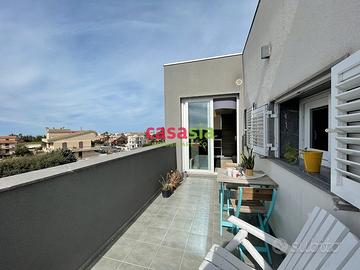 Mansarda con terrazzino e garage Viale delle Ameri