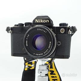 Nikon FE (o FM) nera con Obiettivo Nikon Series E