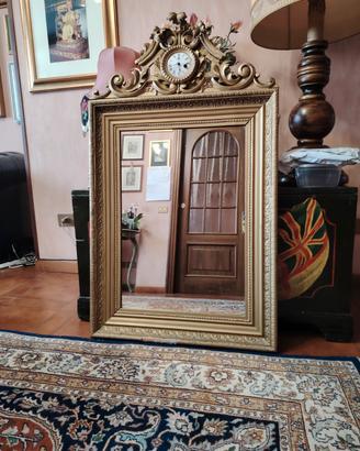 Specchiera anticacon orologio.