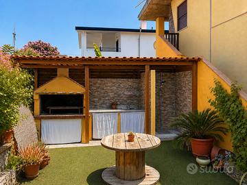 Trilocale con giardino e barbecue